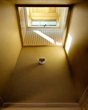 Wall Sconces in stairwell of private residence