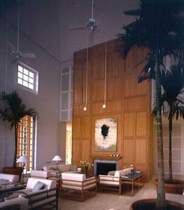 Wall Sconces as pendant on long stems in living room of private residence
