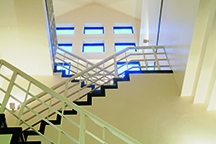 Wall Sconce lighting fixtures in stairwell of office building