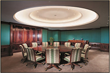 Office Video Teleconference room with round table and cove lighting