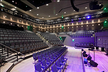 Recessed Wall Wash Lighting surrounds theatre center concert hall